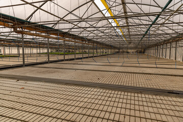 Empty greenhouse with irrigation system
