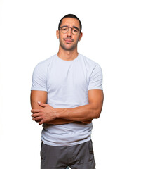 Tired young man doing a gesture of boredom