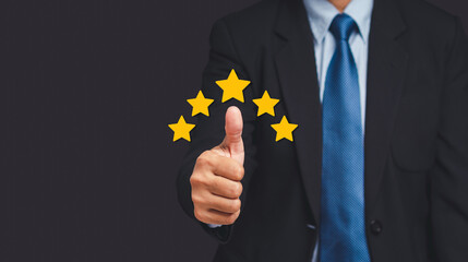 Businessman hand with thumb up for best excellent services satisfaction client giving a five-star rating