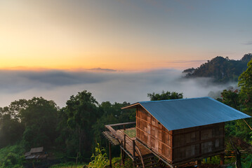 Hill tribe minority house's, home stay for tourist in the morning fog at sunrise on the mountain in...