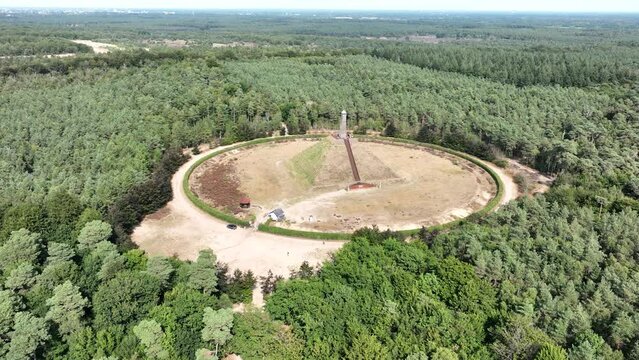 The Pyramid of Austerlitz monument consisting of a grass clad pyramid shaped sand mound stone obelisk. Utrecht municipality of Woudenberg. Aerail drone overview panorma platform.