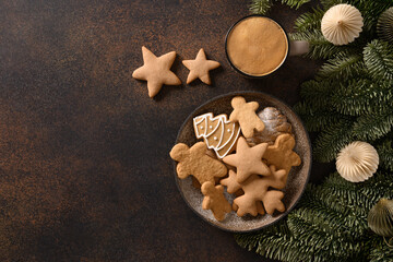 Obraz na płótnie Canvas Christmas cookies and coffee for festive holiday and eve. View from above. Copy space. Xmas greeting card.