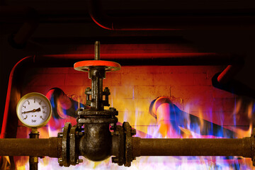 Faucet on old gas pipes or water pipes. Room heating. Energy industry. The concept of fire....