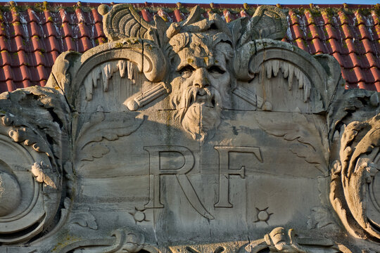 red brick and art deco tiled decoration on the facade of Lamartine middle school in Dunkirk, france