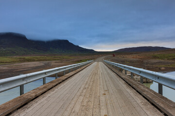 Fototapeta na wymiar wooden bridge over the river, Iceland
