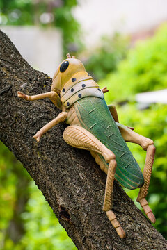Grasshopper As A Yard Toy