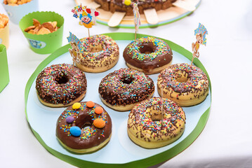 Fresh homemade donuts with icing.