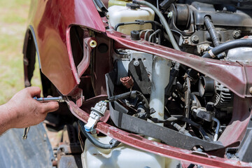 Obraz premium Due to extent damage caused by car accident, it is necessary to install new headlights on vehicle
