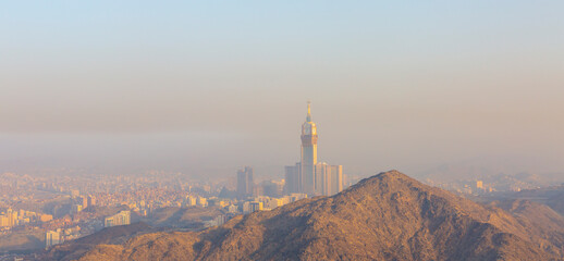 City view of zamzam tower and a foggy makkah morning
