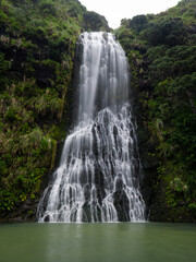 Fototapeta na wymiar Multi-tiered falls of Karekare falls, Auckland, New Zealand.