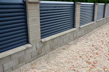 metal fillings of the fence with an underlay of concrete blocks. A metal aluminum fence will...