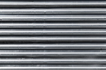 Photo texture of corrugated metal wall, front view