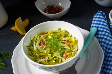 White cabbage with dill and diced bacon