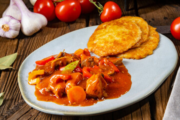 Hungarian goulash with potato pancakes