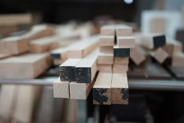 Contemporary Carpenter Working, Portrait of modern carpenter making wood furniture while working in joinery lit by sunlight with factory background on small business concept, copy space