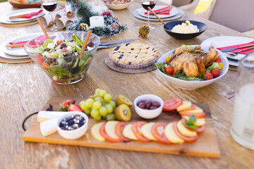 Close up of table with christmas dishes in dining room