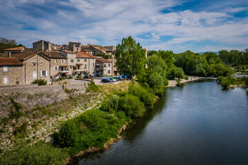 Fototapeta na wymiar View on the medieval village of Lanas and the Ardeche river in the South of France