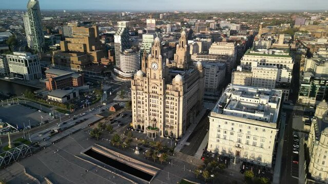 The Liver Building, Liverpool waterfront 10.10.22 - slow anti-clockwise aerial drone pan from south to west, ocean liner (Norwegian Dawn) reveal.