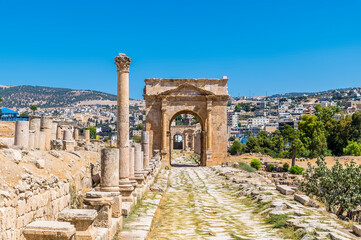 A view down a colonnaded street towards the North Gate in the ancient Roman settlement of Gerasa in...