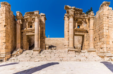 Fototapeta premium A view across the Sanctuary of Artemis in the ancient Roman settlement of Gerasa in Jerash, Jordan in summertime