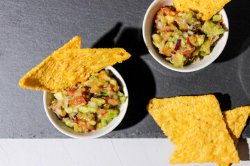 Mexican guacamole sauce with nachos chips