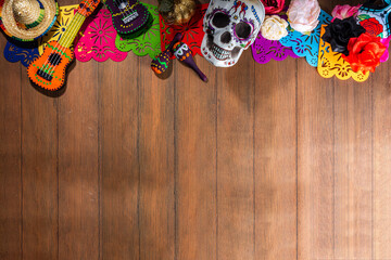 Spanish Mexican traditional holiday, autumn festival Day of the Dead (dia de los muertos) background. With traditional Pan de Muerto bread, decorations and marigold and cempasuchil flowers