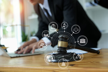 judge on wooden table And experienced lawyers meet with clients and give advice behind the scenes. legal services legal consulting concept