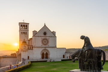 Magic sunset over Assisi old town in Umbria Italy - obrazy, fototapety, plakaty