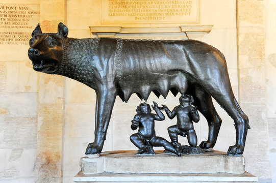 Statue of the mythical she-wolf suckling the infant twins Romulus and Remus in Rome, Italy - The sculpture is a symbol of Rome, the ethernal city - Travel concept in european art cities, wanderlust