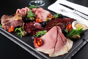 cold cuts on black background