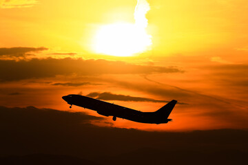 airplane in the sunset
