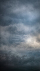 Texture of bright blue dramatic cloudy sky.