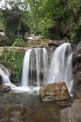 waterfall in the woods long exposure
