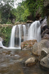 waterfall in the woods long exposure
