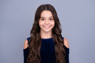 Happy face, positive and smiling emotions of teenager girl. Little kid girl 12,13, 14 years old on isolated background. Children studio portrait. Emotional kids face.