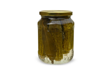 Glass jar with pickled cucumbers on white background. canned cucumbers