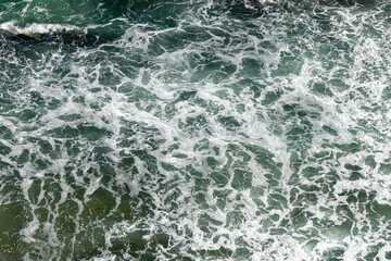 Sea surf. Top view at the sea.