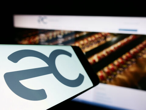 Stuttgart, Germany - 10-01-2022: Cellphone with logo of Chilean company Empresas Copec S.A. on screen in front of business website. Focus on left of phone display.