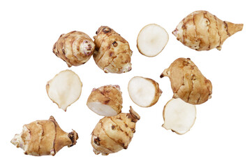 Jerusalem artichoke and pieces are flying on a white background. Isolated