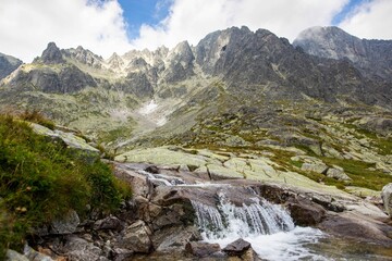 Raging waterfall in the Velka Studena dolina valley © Szabi Bella/Wirestock Creators