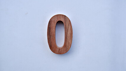 wooden number one , selective focus number white background . Top view isolated photo. 