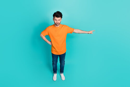Full size photo top angle view of rage guy ask employees go away point empty space isolated on cyan color background