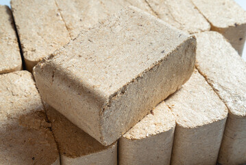 Lot of Wood Briquettes for heating,  textured background