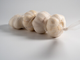 Garlic on a light background. Healthy food concept.