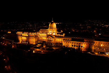 Fototapeta premium Aerial Drone Photo - Buda Castle lit up at night. Budapest, Hungary