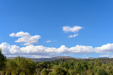 Fototapeta na wymiar Nature landscape and sky with clouds of Navaluenga in Avila in Spain