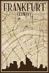 Brown vintage hand-drawn printout streets network map of the downtown FRANKFURT AM MAIN, GERMANY with brown 3D city skyline and lettering