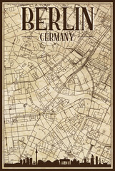 Brown vintage hand-drawn printout streets network map of the downtown BERLIN, GERMANY with brown 3D city skyline and lettering