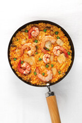 seafood paella with prawns and fish