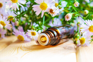 Obraz na płótnie Canvas flower oil in glass bottles.homeopathy.selective focus